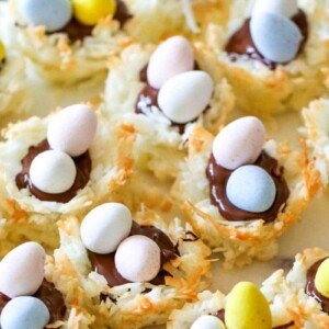 You're gonna love these Coconut Macaroon Nests that are filled with dark chocolate and topped with Mini Cadbury Eggs because they are the perfect Easter treat!ย #macaroons #coconut #cookies #easter #dessert #allthingsmamma | allthingsmamma.com