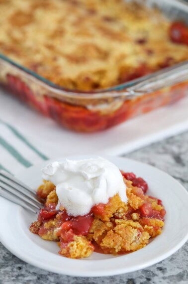 This Cherry Pineapple Dump Cake is the most delicious and easy dump cake recipe you’ll ever try! Made with only 4-ingredients - just dump all the ingredients into a baking pan, bake and eat! #dumpcake #cake #dessert #cherry #allthingsmamma | allthingsmamma.com