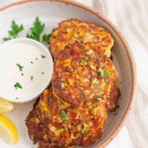 A plate of zucchini corn fritters.