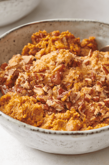 A bowl of pumpkin cobbler.