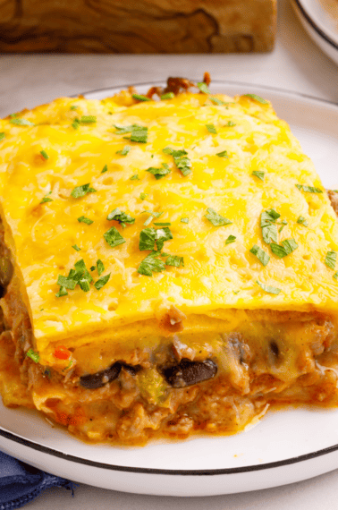 A portion of taco lasagna on a plate.