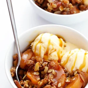 a bowl of slow cooker apple crisp.