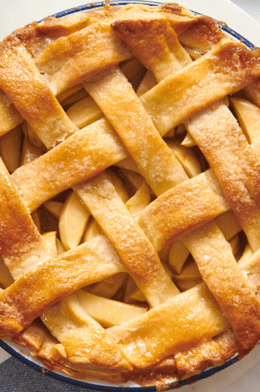 Overhead image of a Granny Smith apple pie with a lattice crust.