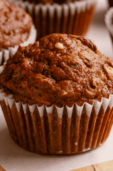 A morning glory muffin in a paper liner.