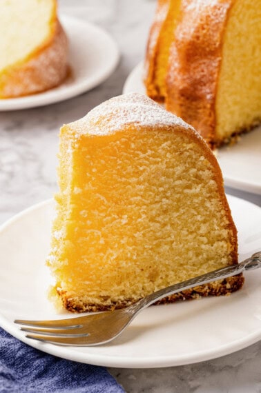 A slice of buttermilk pound cake on a plate.
