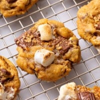 HomemadePumpkin S'mores Cookies on a cooling rack.