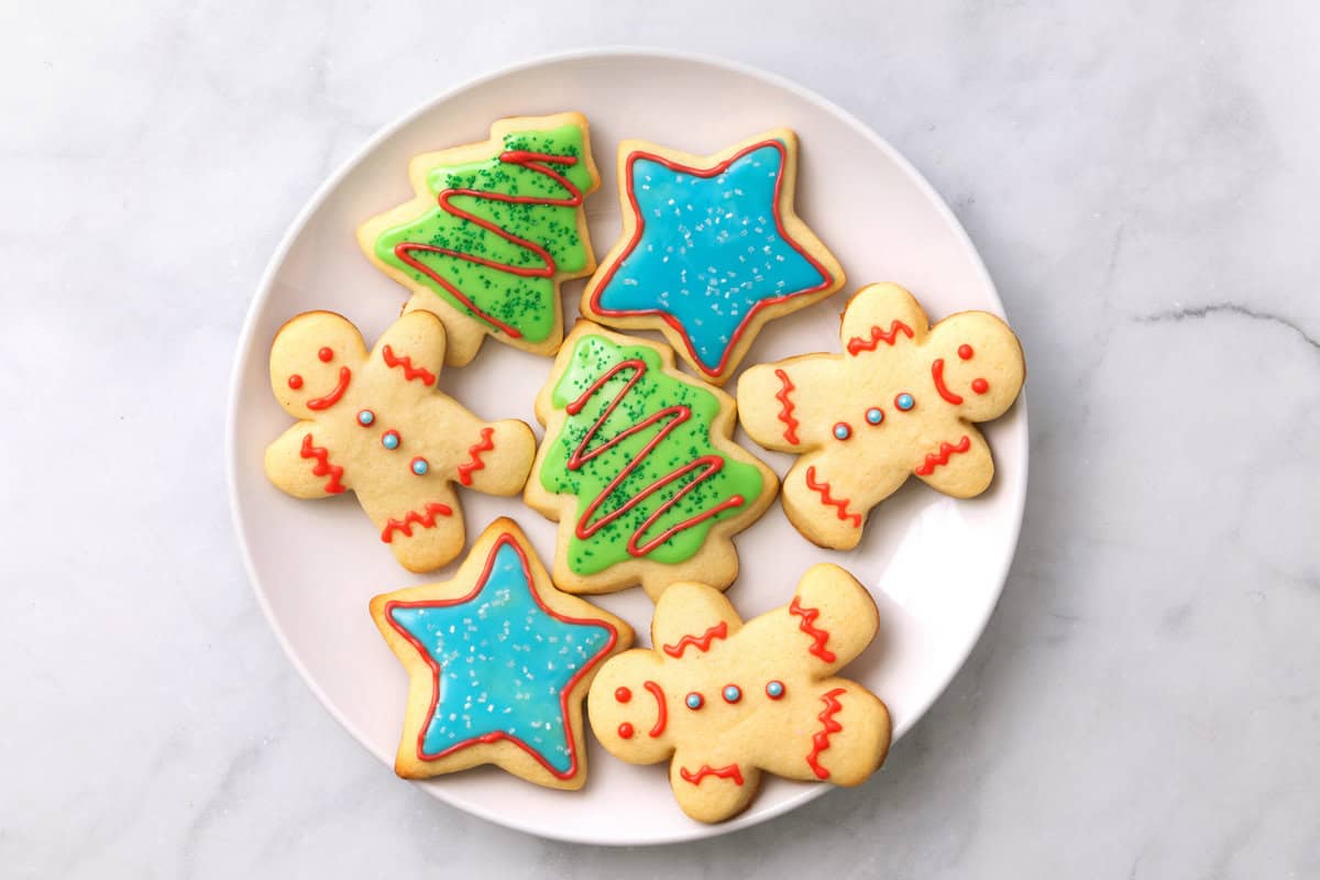 Sugar Cookie Icing A finished plate of sugar cookies decorated with Sugar Cookie Icing .