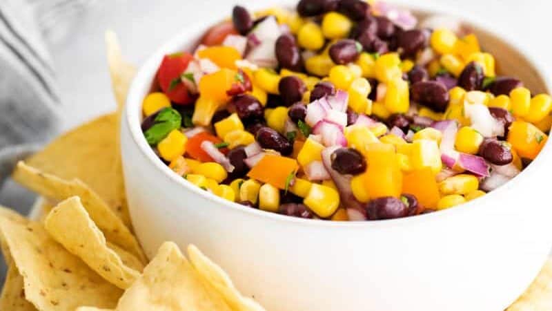 Black bean corn salsa Black Bean and Corn Salsa in white bowl with chips