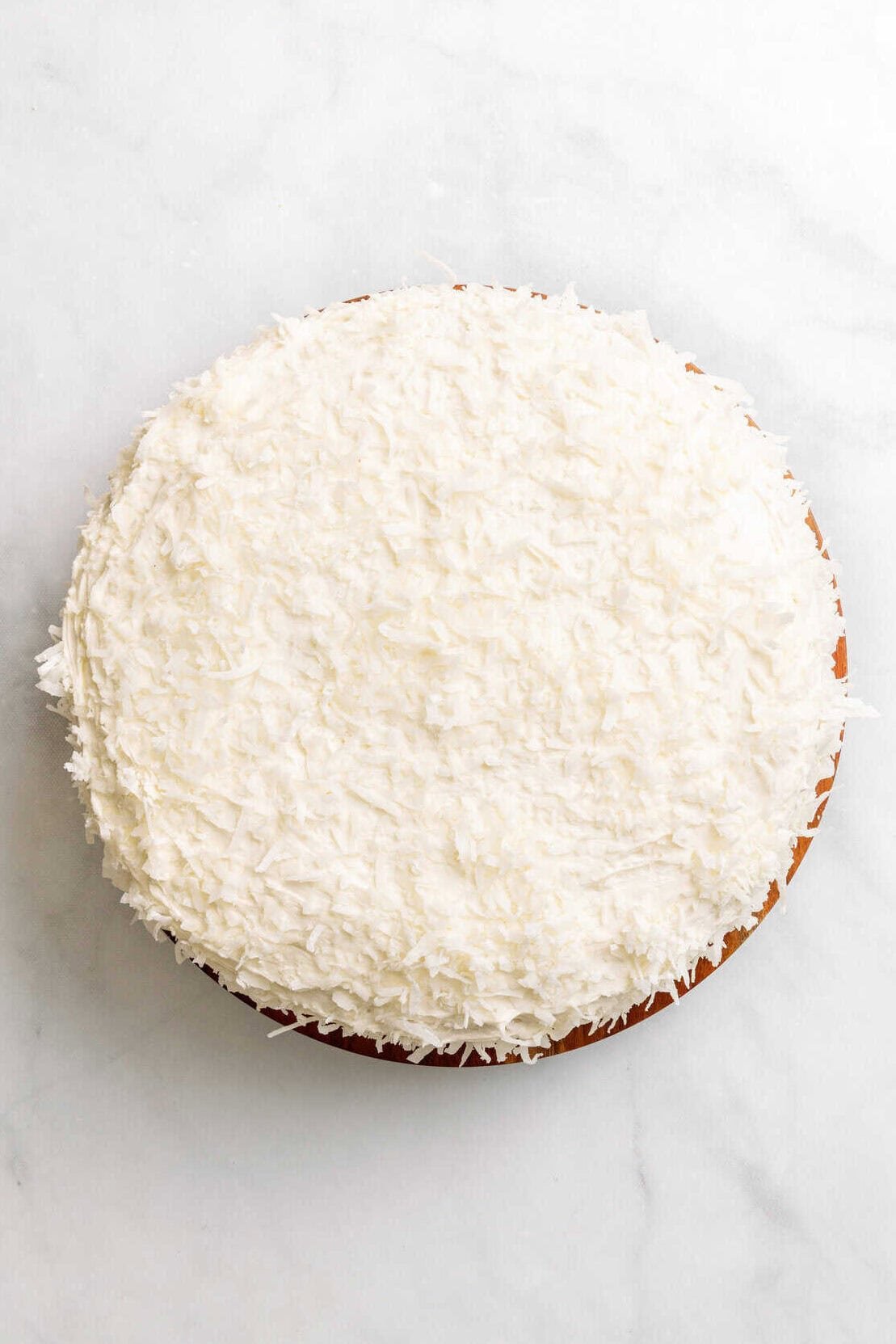 finished lemon coconut cake assembled lemon coconut cake.