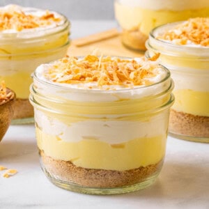 Jars filled with coconut cream pie parfait