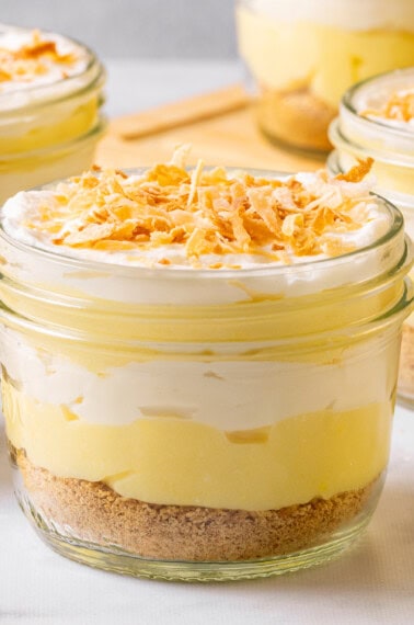 Jars filled with coconut cream pie parfait